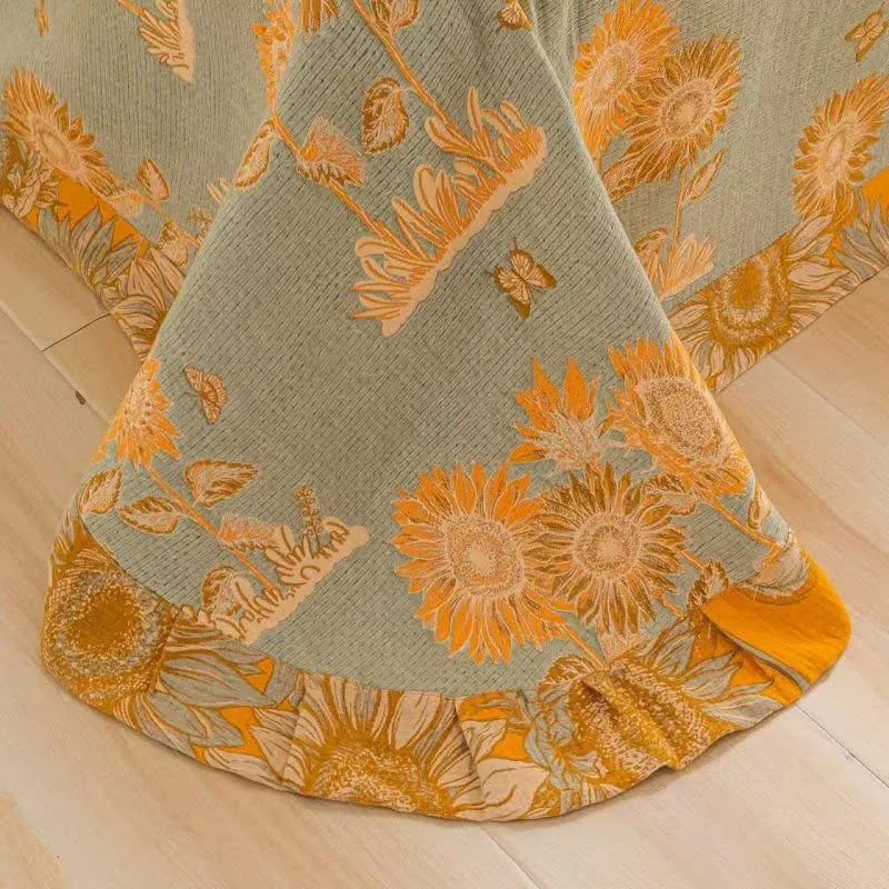Wende-Bettwäscheset aus Baumwollgaze mit Sonnenblumenmotiv (4-teilig)