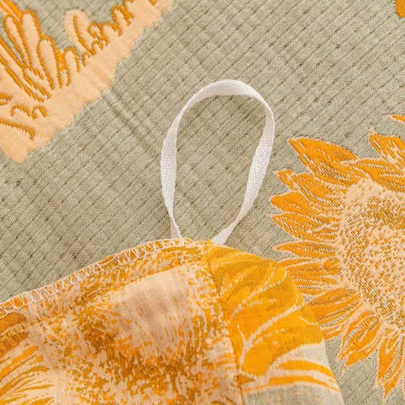 Wende-Bettwäscheset aus Baumwollgaze mit Sonnenblumenmotiv (4-teilig)
