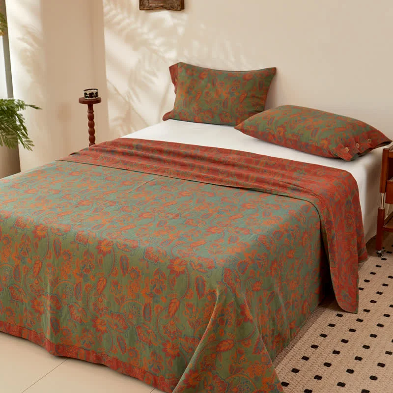 Wende-Bettdecke aus garngefärbter Baumwollgaze mit Retro-Blumenmuster