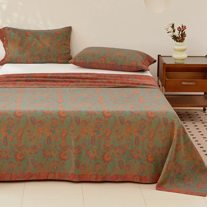Wende-Bettdecke aus garngefärbter Baumwollgaze mit Retro-Blumenmuster