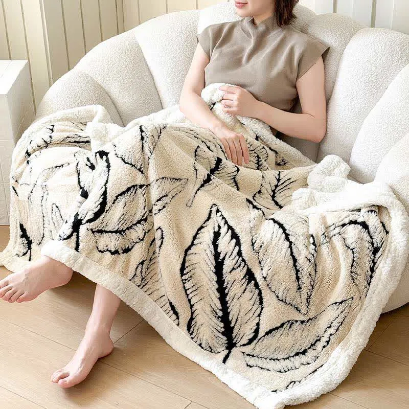 Jacquard-Plüschdecke mit großen Blättern