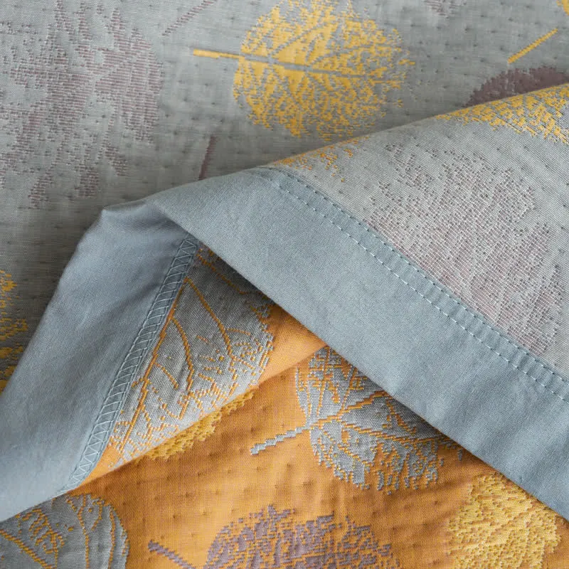 Wendesteppdecke aus Baumwollgaze-Jacquard mit Blättern