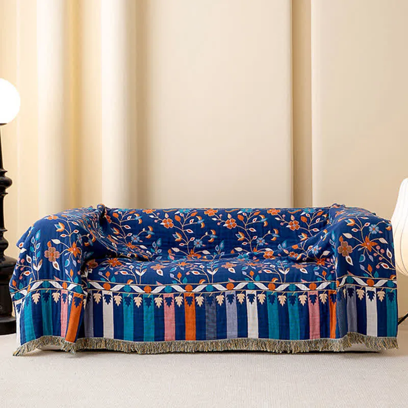 Wendesteppdecke aus Baumwolle mit Vintage-Blumenmuster und Quasten