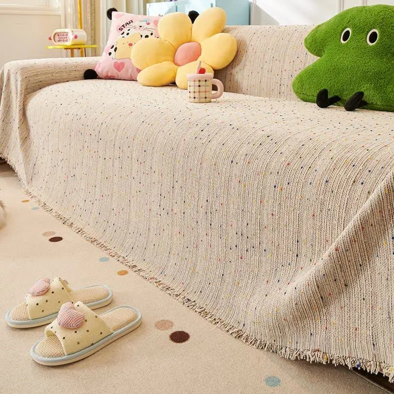 Sofaschoner aus Chenille mit bunten Punkten