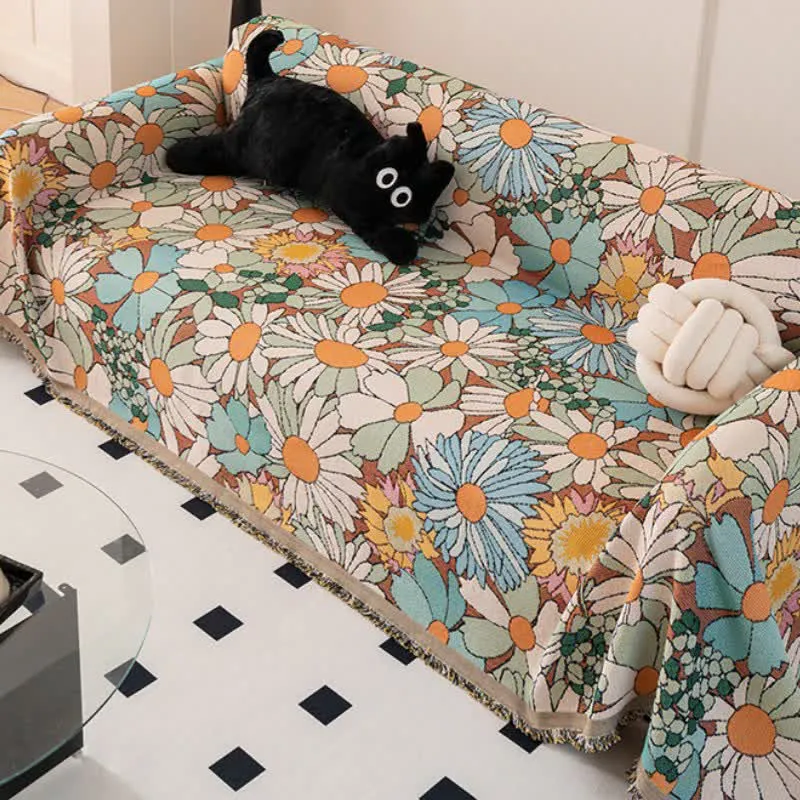 Sofaschoner mit buntem Gänseblümchen-Print