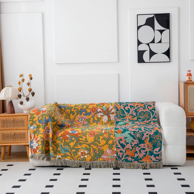 Sofadecke aus Baumwolle mit Vintage-Blumenmuster und Quasten