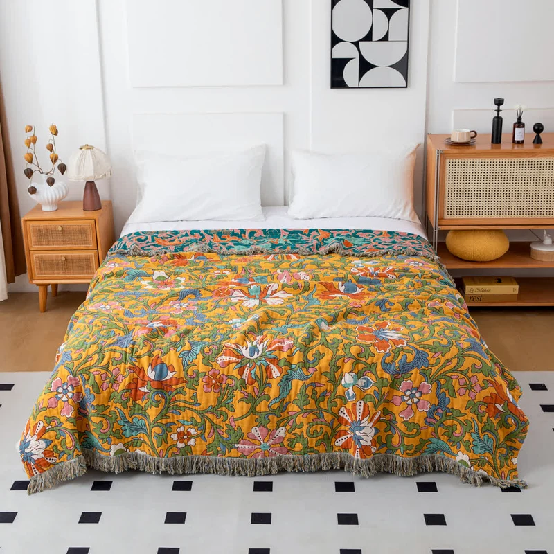 Sofadecke aus Baumwolle mit Vintage-Blumenmuster und Quasten