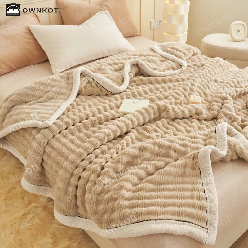 Fleecedecke mit Jacquard-Wellenstruktur