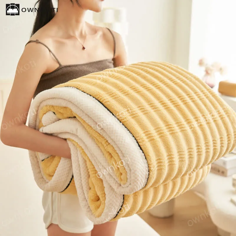 Fleecedecke mit Jacquard-Wellenstruktur