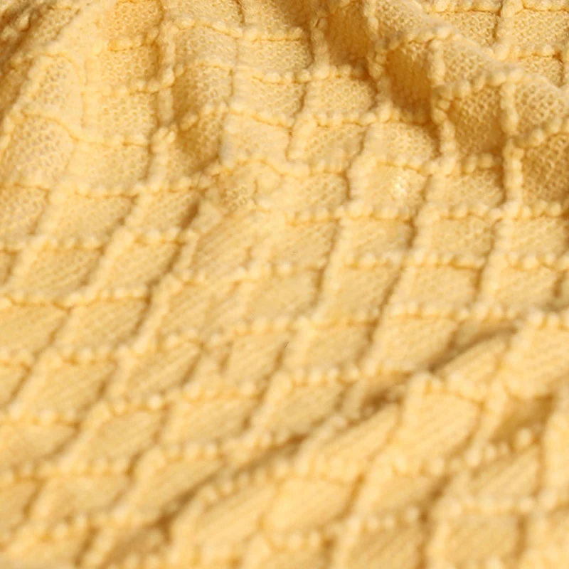 Ownkoti – Gestrickte Sofadecke mit Prismamuster und Quasten