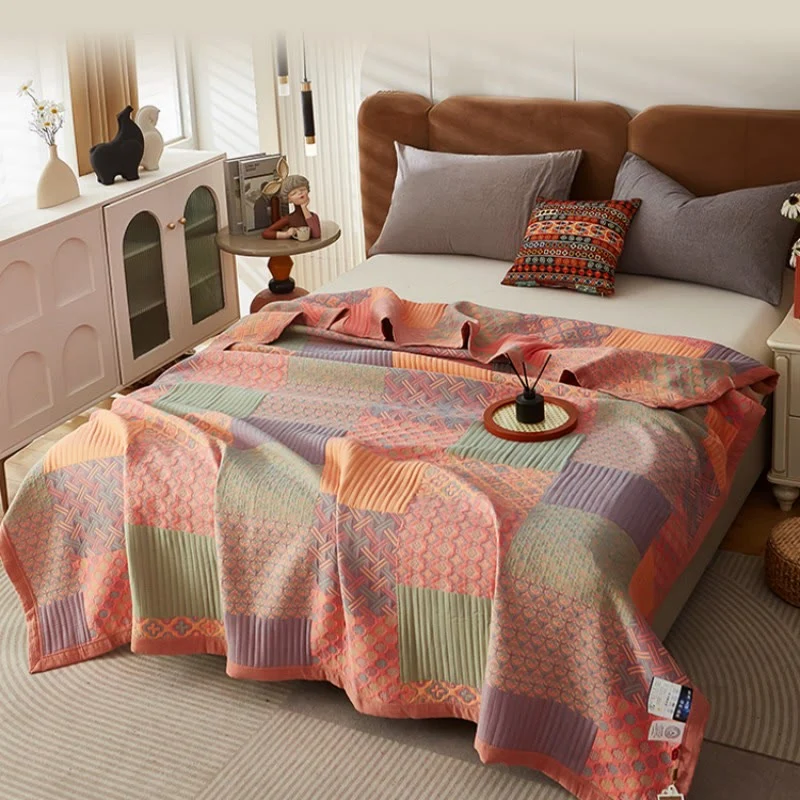 Bunte Wendesteppdecke aus Baumwolle mit quadratischem Muster