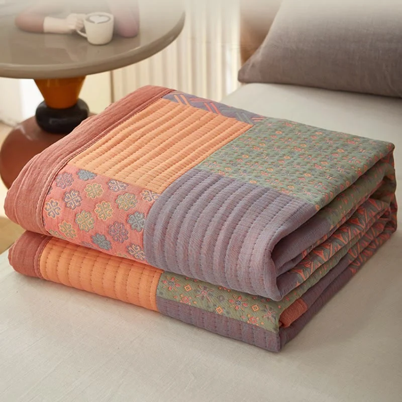 Bunte Wendesteppdecke aus Baumwolle mit quadratischem Muster