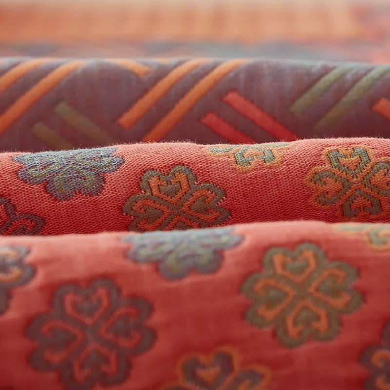 Bunte Wendesteppdecke aus Baumwolle mit quadratischem Muster