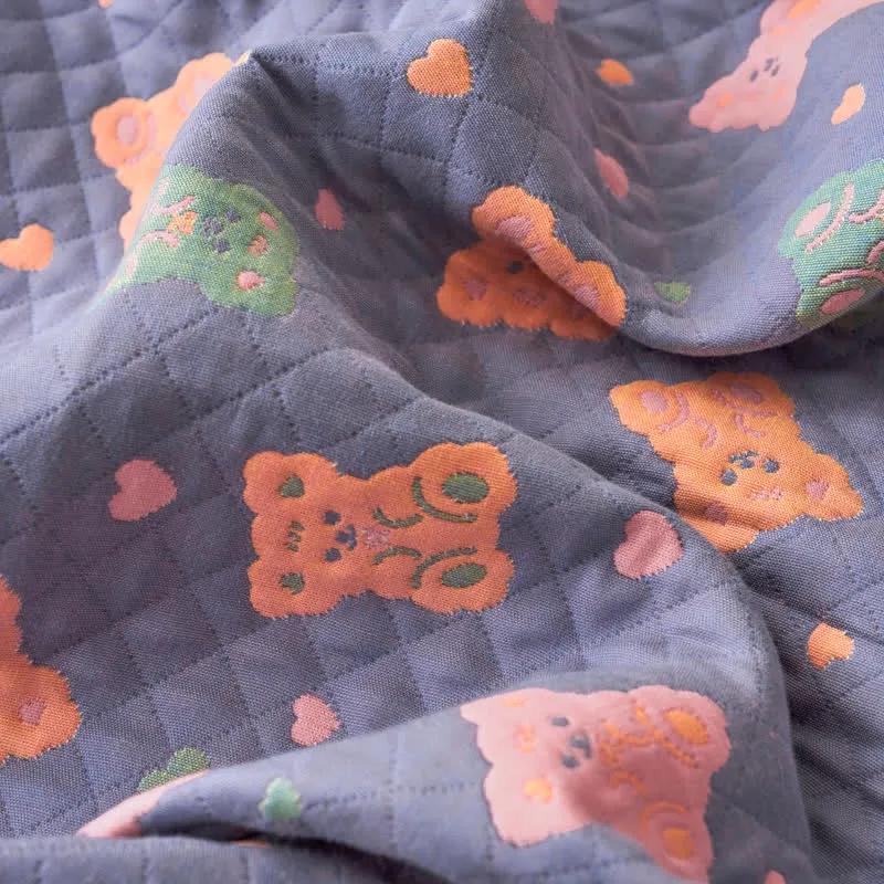 Sofadecke aus Baumwollgaze mit Jacquard-Bär