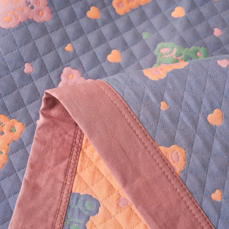 Sofadecke aus Baumwollgaze mit Jacquard-Bär