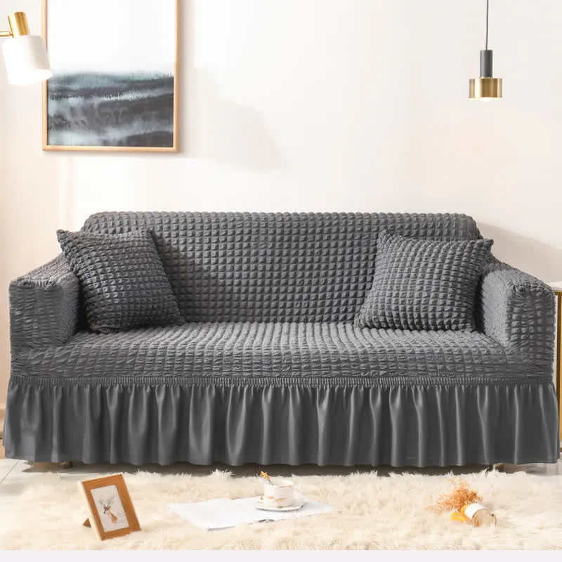 Elastischer Sofabezug mit Rüschen im schlichten Stil