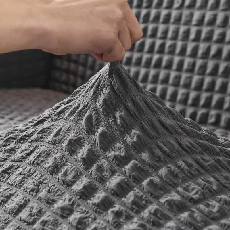Elastischer Sofabezug mit Rüschen im schlichten Stil
