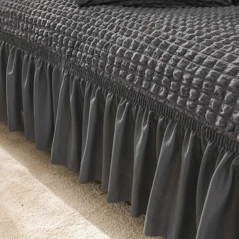Elastischer Sofabezug mit Rüschen im schlichten Stil