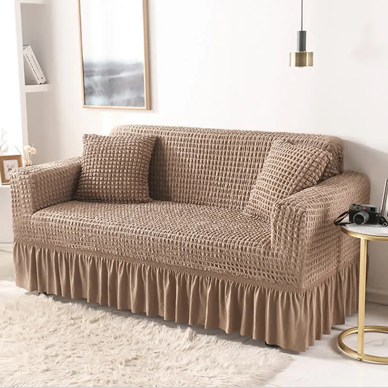 Elastischer Sofabezug mit Rüschen im schlichten Stil